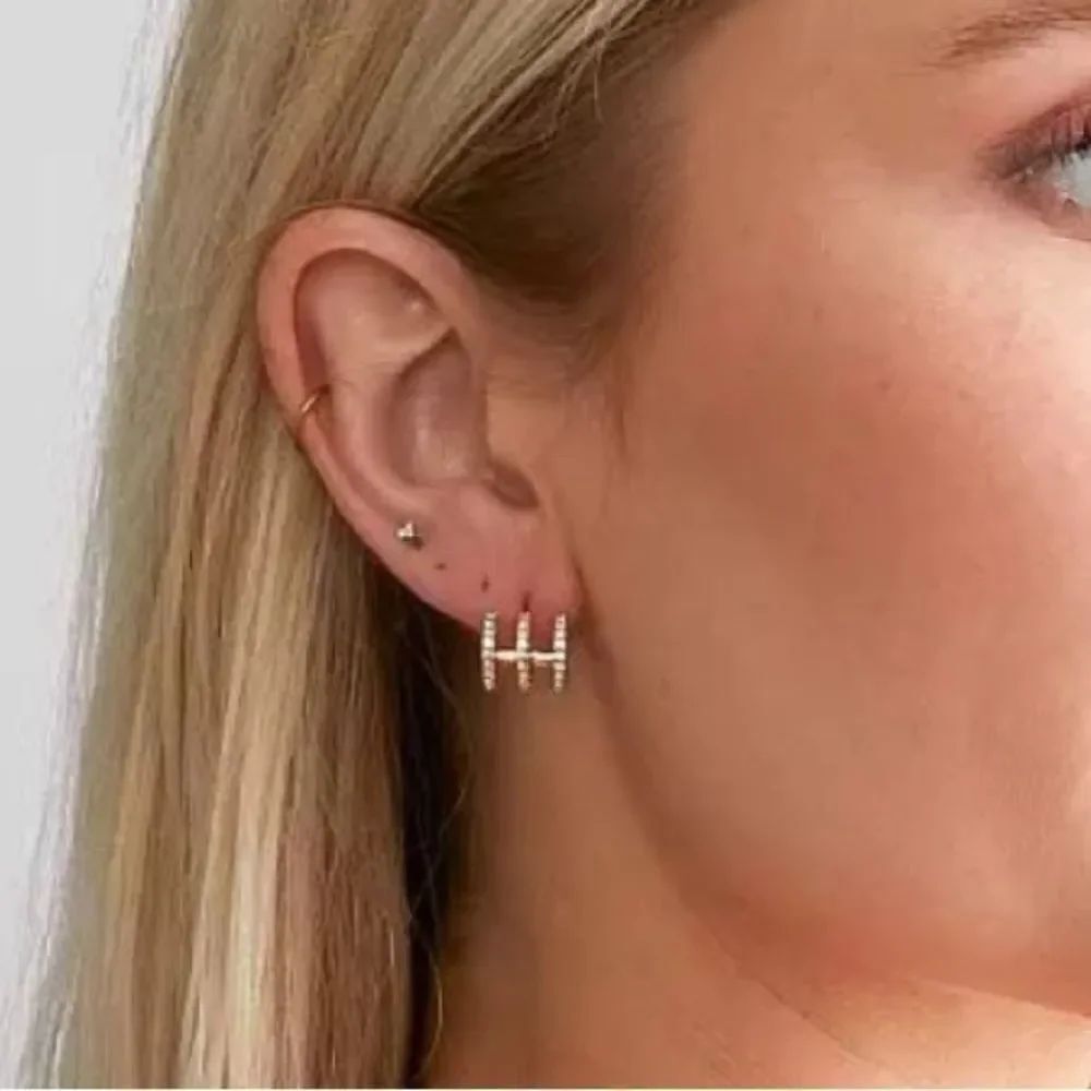 Gold and rhinestone earrings